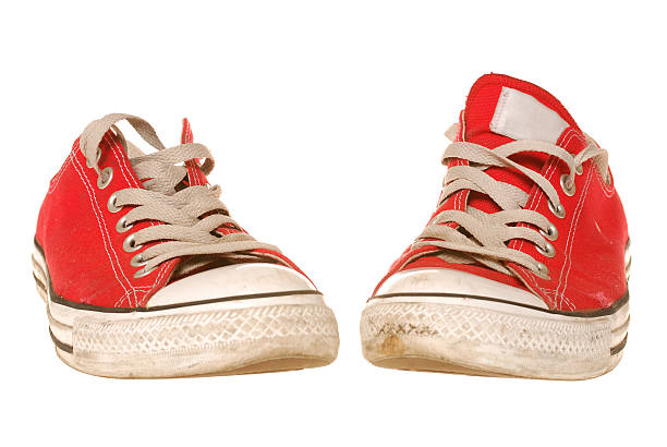 istock Two gym shoes, isolated [clipping path] 140262478