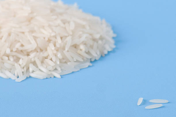 Pile of uncooked white Rice stock photo