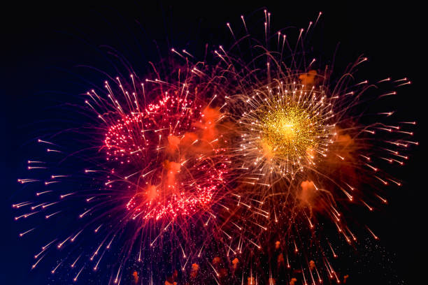 istock Holiday fireworks backgrounds with sparks 1402629598