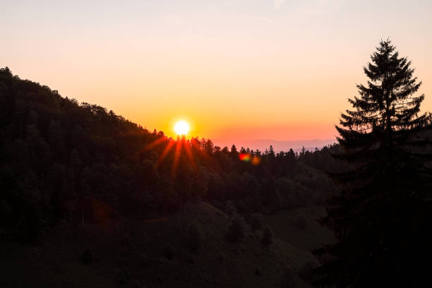 istock Sunset hillside hike scenery with sunlight mountain silhouette 1402631988