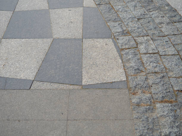 istock Drawing tiles on the pavement. Stone street surface. Masonry. 1402636501