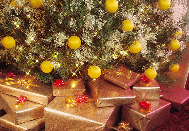 presents under the tree stock photo