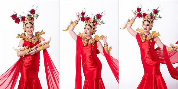 Full length of Young Asian 20s Beautiful Woman, look at camera, wear National Costume Gown. Pageant Female poses in red Chinese traditional dress headwear crown over white background isolated