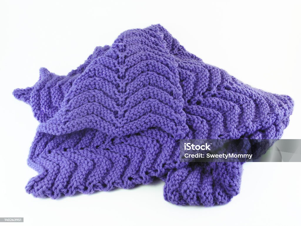 Purple Crochet Afghan A purple hand-crochet baby blanket on a white background. Blanket Stock Photo