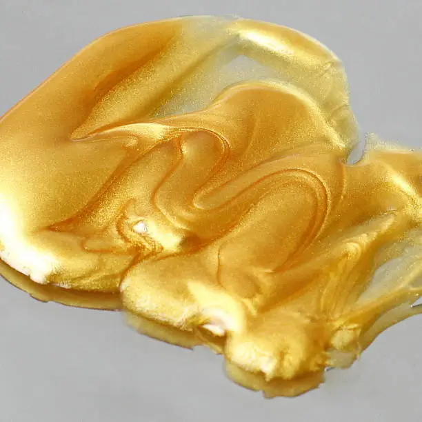 Golden facial mask texture, gold background