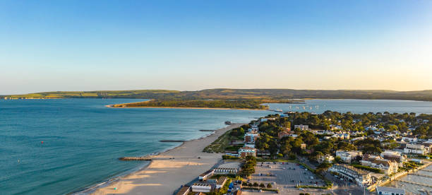 istock Sandbanks to Studland in Poole Harbour 1402644054