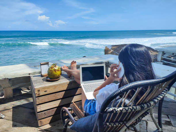 istock Young Digital Nomad Talking With Client Via Smartphone 1402646390