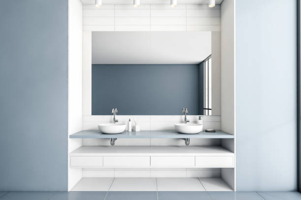 istock Bathroom interior with double sink and mirror, accessories on deck 1402646895