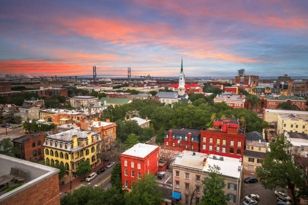 Savannah, Georgia, USA Downtown Skyline Savannah, Georgia, USA downtown skyline at dusk. city street street man made structure place of work stock pictures, royalty-free photos & images