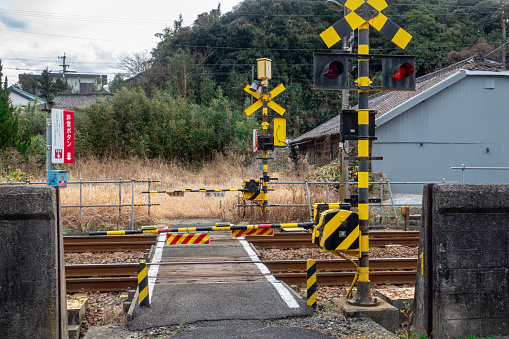 A photo of a railroad crossing.