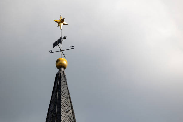 istock Church spire with golden star 1402650438
