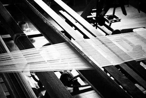 Close-up view of old traditional loom. Black and white view