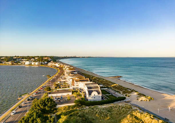 View over Sandbanks towards Bournemouth View over Sandbanks towards Bournemouth sandbanks poole harbour stock pictures, royalty-free photos & images