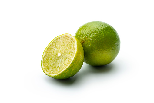 single slice of lime isolated on white background