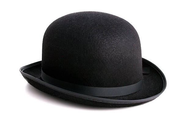 Black bowler hat isolated on white background stock photo