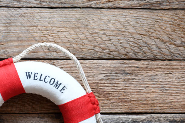 istock WELCOME word on the lifebuoy. 1402656112