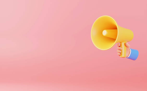 istock Hand holding Megaphone, notification concept on orange background 1402662141