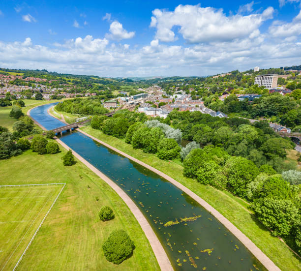 istock Trainline crosses River Exe towards Exeter St Davids Train Station 1402662263