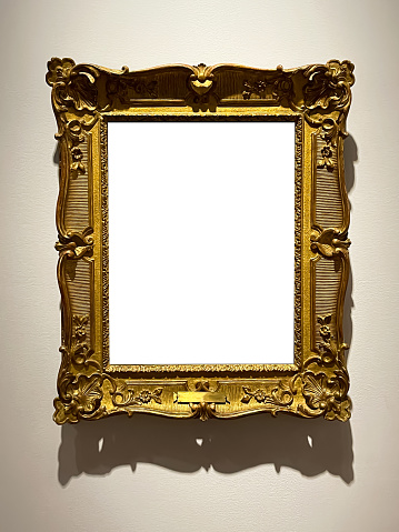 Antique golden art fair gallery frame on the wall at auction house or museum exhibition, blank template with empty white copyspace for mockup design, artwork concept