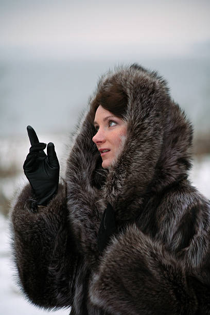 istock beautiful girl in a fur coat 140266597