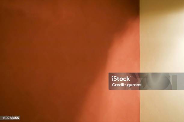 Mottled Wall With Lights And Shadows Stock Photo - Download Image Now - Cream - Dairy Product, Shadow, Wall - Building Feature