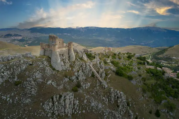 Photo of aerial view of the medieval castle of rocca calascio abruzzo during sunrise
