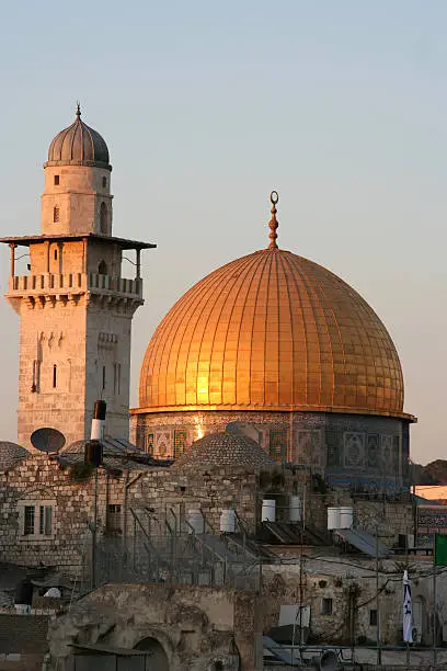The golden Dome of the Rock at sunset
