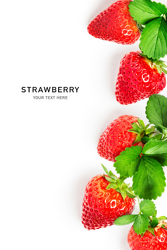 Fresh strawberry fruits and leaves composition and creative border on white background. Healthy eating and food concept. Spring fruit and berry arrangement. Top view, flat lay, copy space