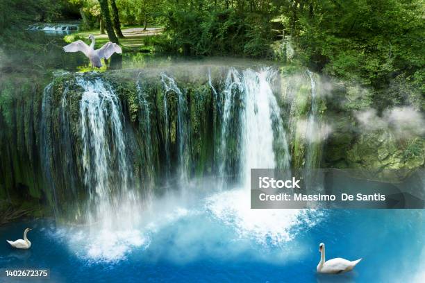 Waterfall Of The River Elsa In The Village Of Stock Photo - Download Image Now - Beauty, Blue, Color Image