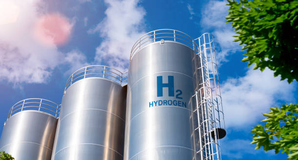 Hydrogen renewable energy production - hydrogen gas for clean electricity solar and windturbine facility stock photo