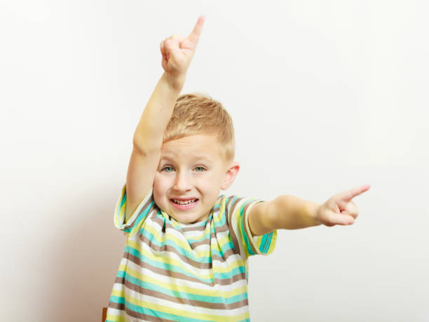 istock Happy kid boy looking straight to camera 1402673071