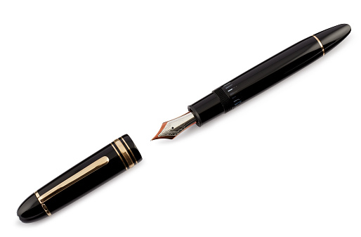 Close-Up High Angle View Of Pen Over White Background