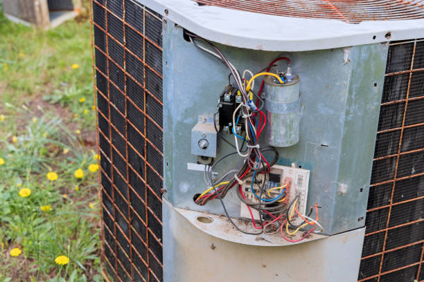 istock Replacing the old central air conditioner unit 1402675560