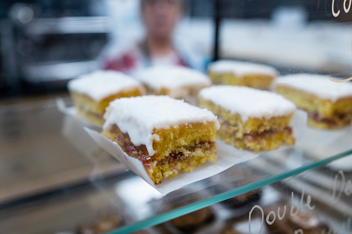 Homemade slices of cake being sold in a cafe/store that promotes sustainable living in the North East of England. The cafe uses sustainable ingredients.