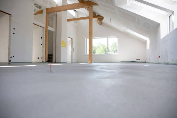istock freshly cured concrete screed on construction site in family house 1402676135