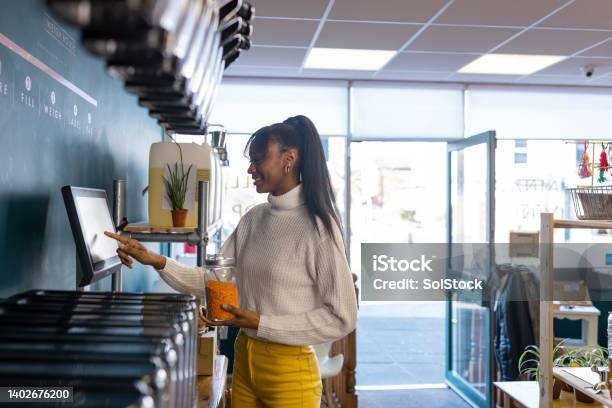 Shopping Sustainably Stock Photo - Download Image Now - Supermarket, Groceries, Self Checkout
