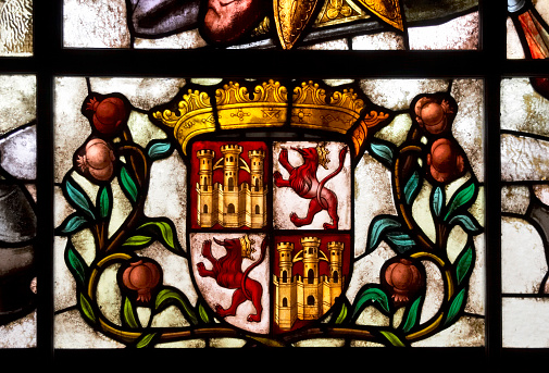 Stained glass window depicting a Coat of Arms in the cathedral of Burgos, Castille, Spain.