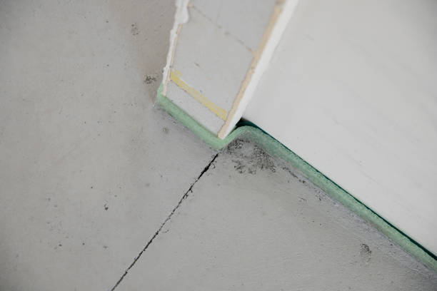istock freshly cured concrete screed on construction site in family house 1402679450