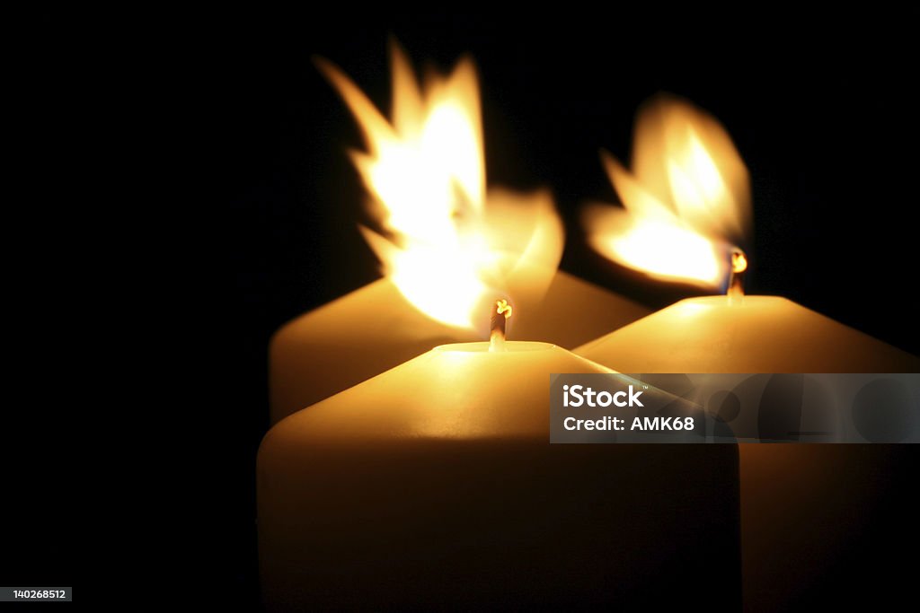 Three candles Three candles in the wind Candle Stock Photo