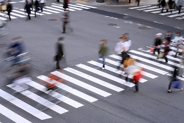 istock Blurred image of people walking on a crosswalk 140268579