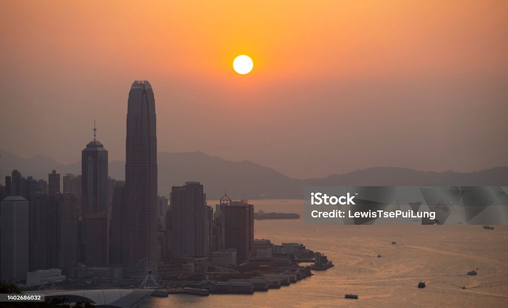 towers at Hong Kong island during sunset central area, the towers at Hong Kong island during sunset Afterglow Stock Photo