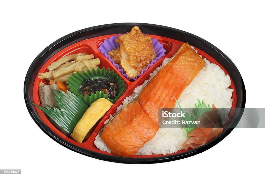 Japanese lunch box 1 Japanese lunch box (obento) with fish,rice and vegetables.          Box - Container Stock Photo