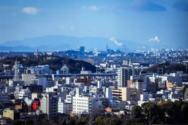 Himeji, Japan - January 08, 2020: Panoramic View to the Himeji city downtown with Business Buildings and Houses