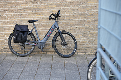 Rijnsburg, Netherlands - April 19, 2022: Gazelle Electric Bike parked at wall in Rijnsburg, Netherlands