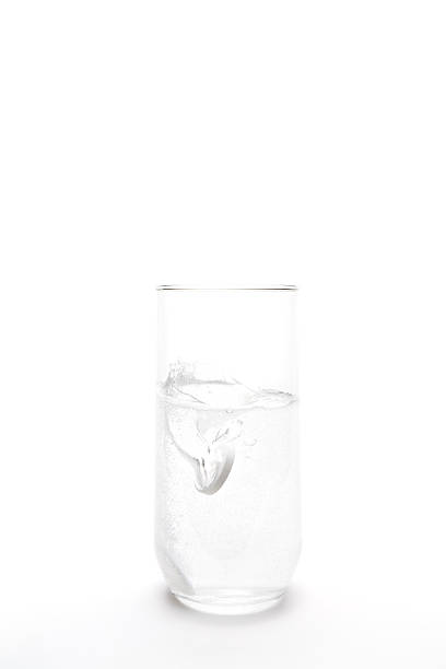 istock aspirin splash in water glass 140268861