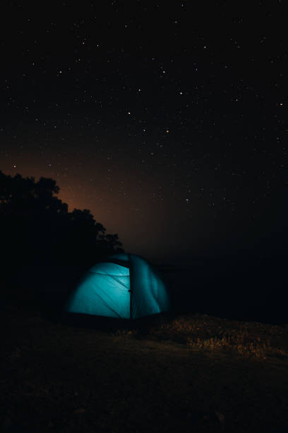 istock Camping Under the Stars on the Beach 1402689369