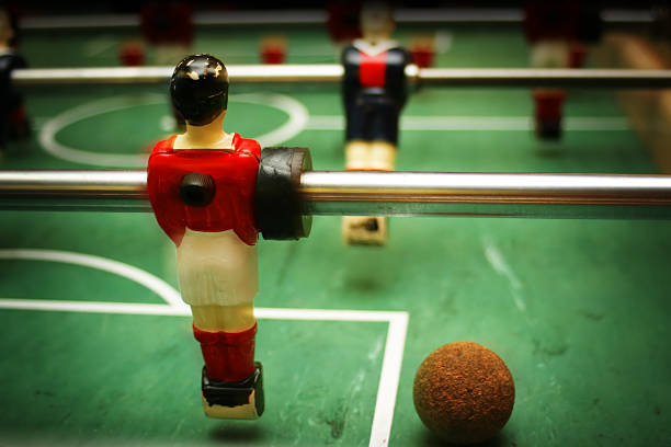 istock babyfoot player with ball 140268960
