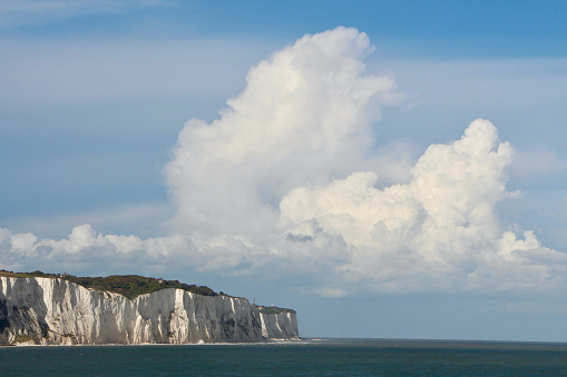 White Cliffs of Dover from the sea cloudy sky