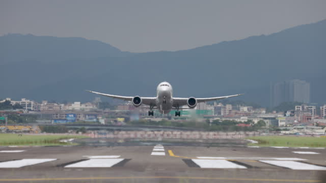 The plane takes off from the runway