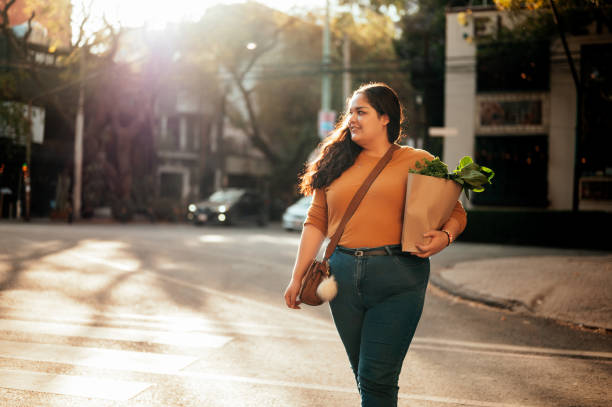 istock Woman coming back from the market. 1402695998